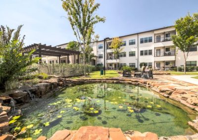 Picture of the courtyard pond at Solea Copperfield
